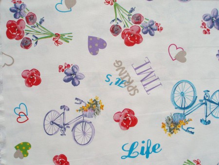 Poťahová látka biela s bicyklami, šírka 140 cm, cena 5,90 €